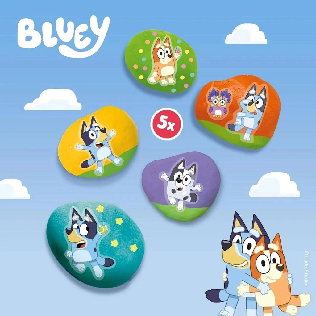 Set of five painted character rocks with colorful dot details