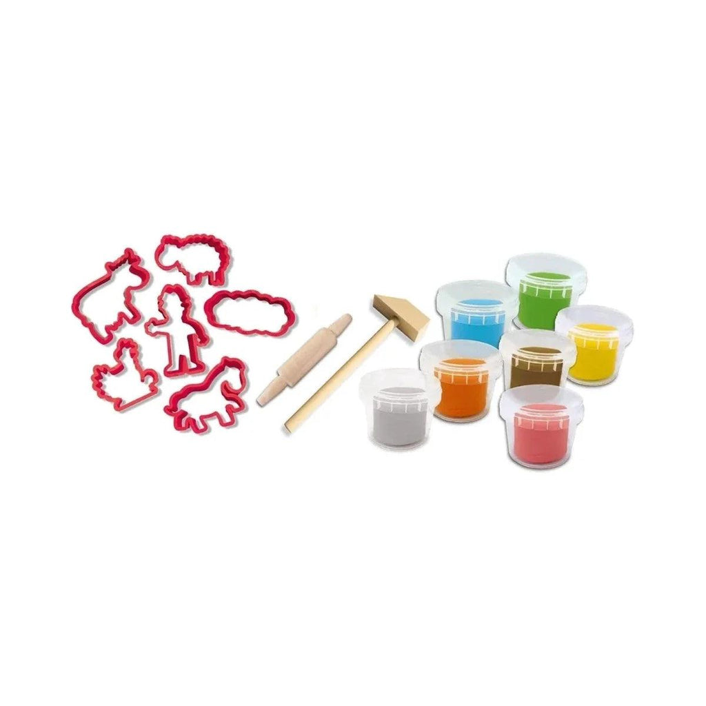 Red cookie-cutter molds, wooden rolling pin, and seven colored dough jars
