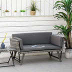 Grey outdoor rattan sofa with seat and back cushions, two armrests