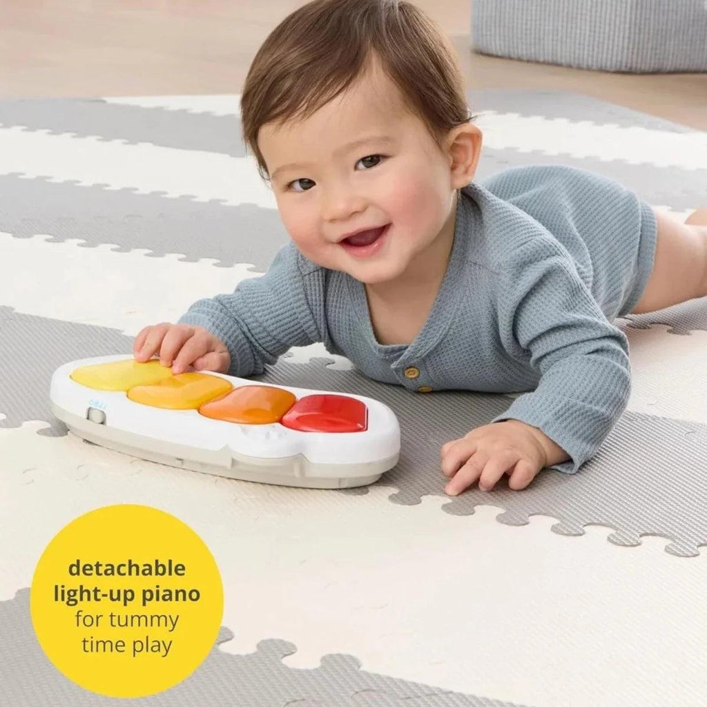 Detachable light-up piano base with colored keys for tummy time play