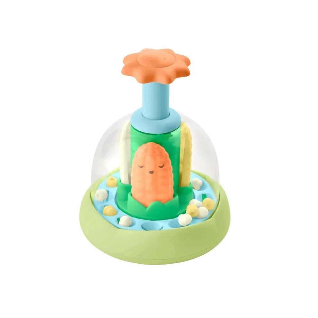 Push-and-spin baby walker toy with green base, blue post, and orange garden piece
