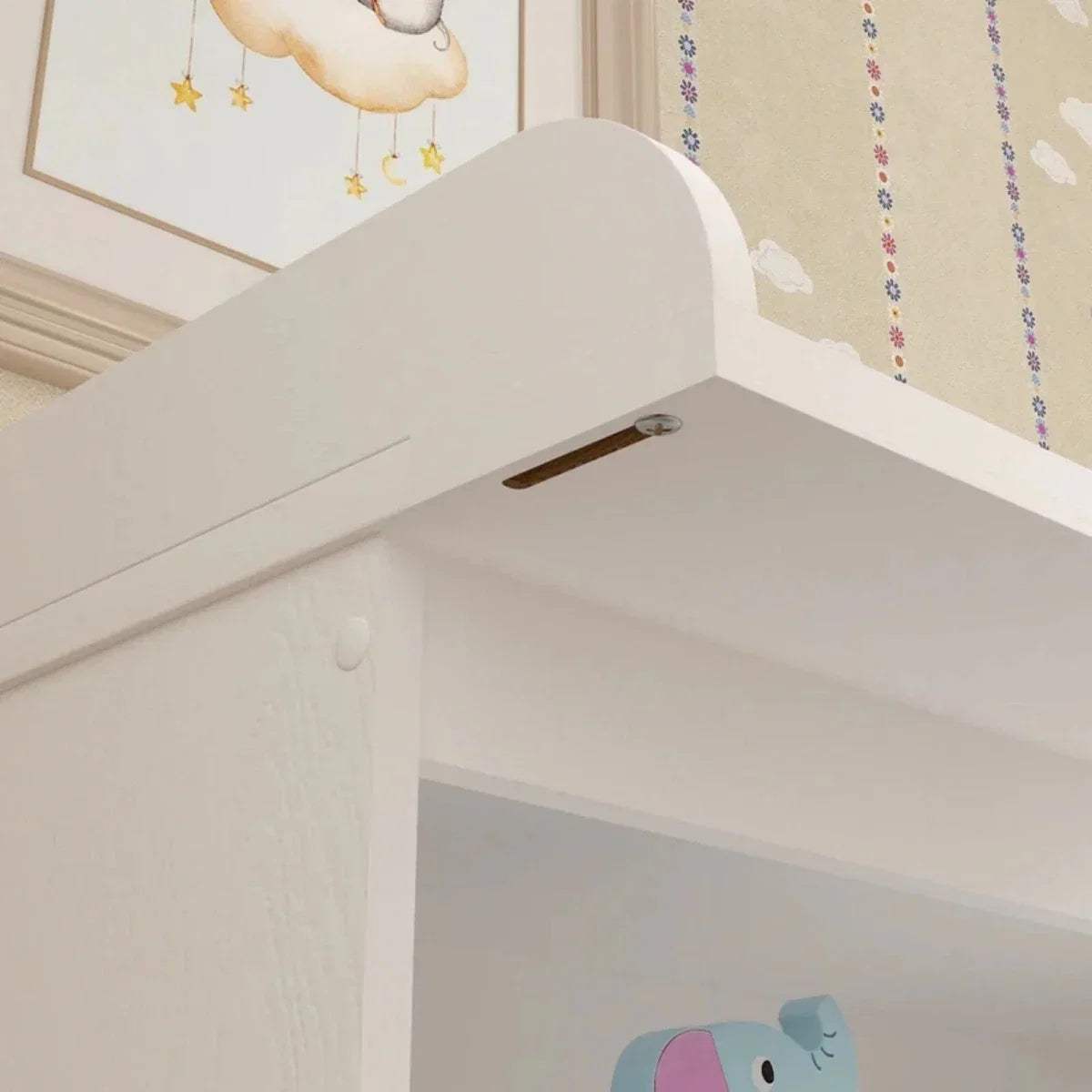 White changing unit top with curved safety sides and open storage below