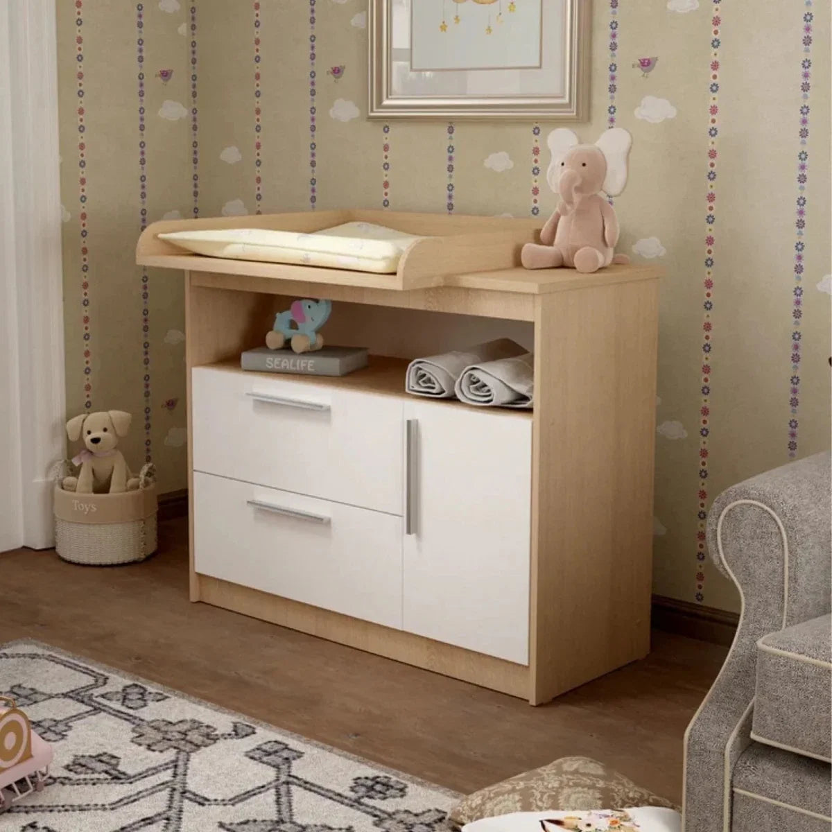 Shefa kids changing unit in elm wood and white, with changing pad and storage doors