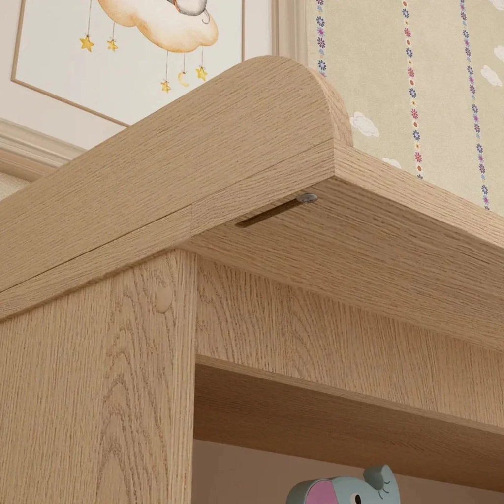 Shefa kids changing unit corner with elm wood frame and raised changing surface edge