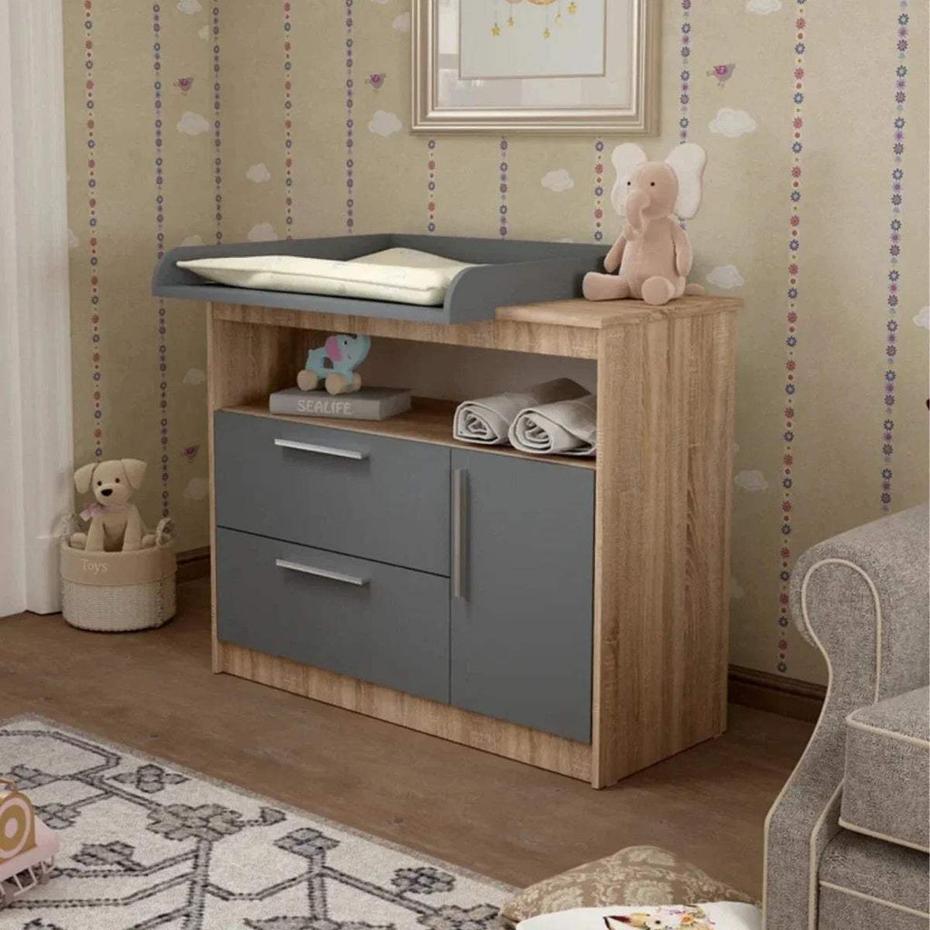 Kids changing unit with graphite base, oak sides, top changing pad and open shelf storage.