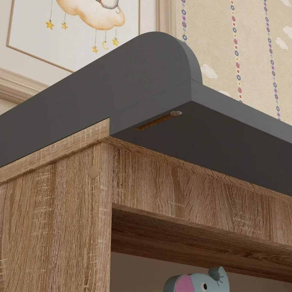 Kids changing unit safety rail in dark graphite with oak side panel and smooth wood finish.