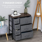Dark grey drawer chest with 7 fabric drawers and dark wood-look top on legs.