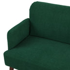 Dark green upholstered loveseat sofa with rounded armrests and thick seat cushion