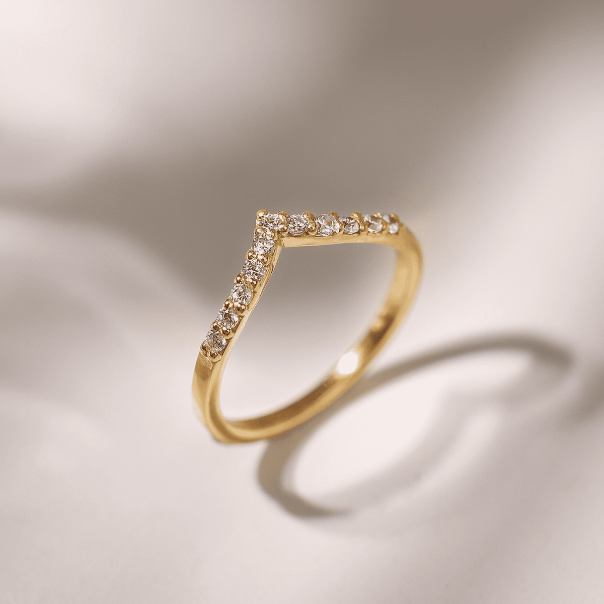 Wishbone curved eternity ring in gold vermeil with pave stones