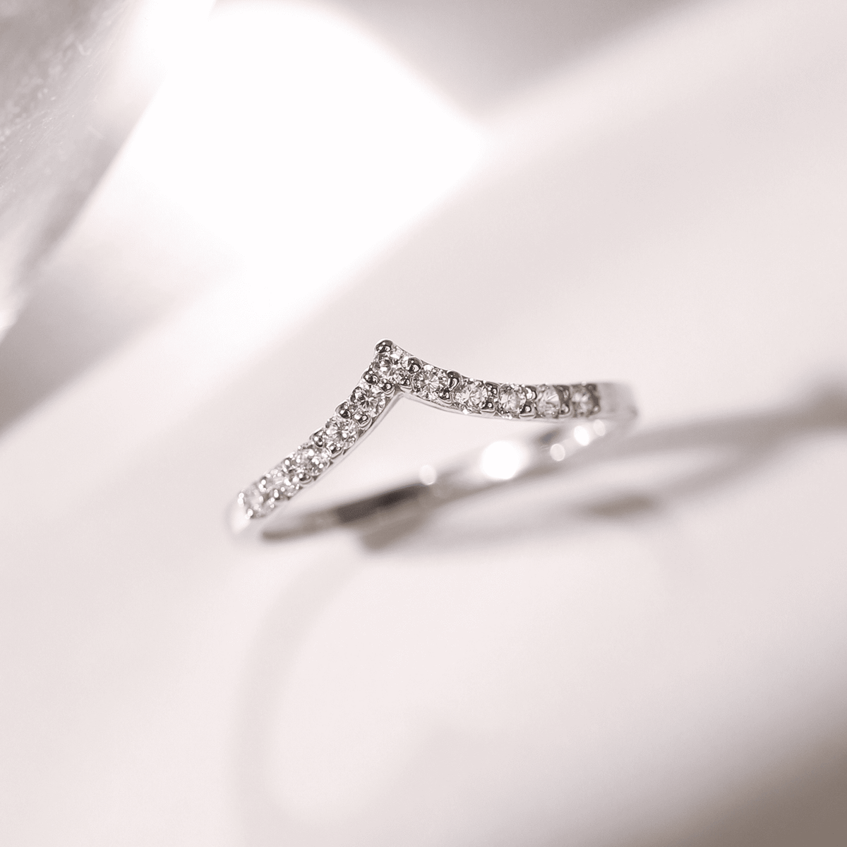 Wishbone curved eternity ring in sterling silver with pavé stones