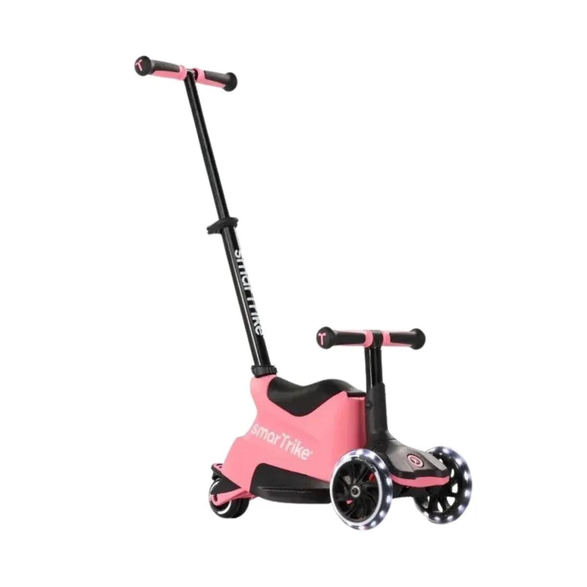 smarTrike ride-on scooter in salmon pink with black handlebar and front wheels