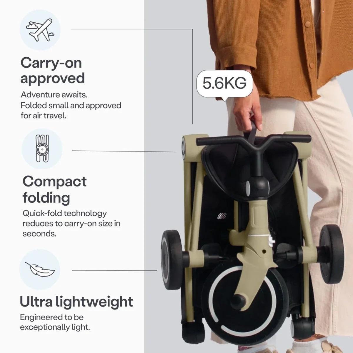 Olive stroller trike with compact fold and black seat, shown beside a carry handle