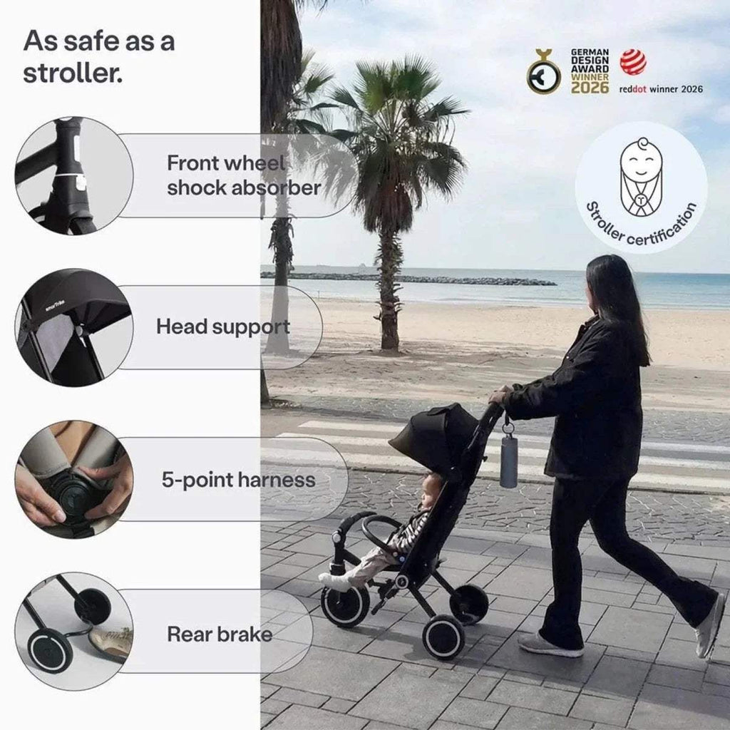 Jet black stroller trike with canopy and wheels, outdoor use with feature callouts