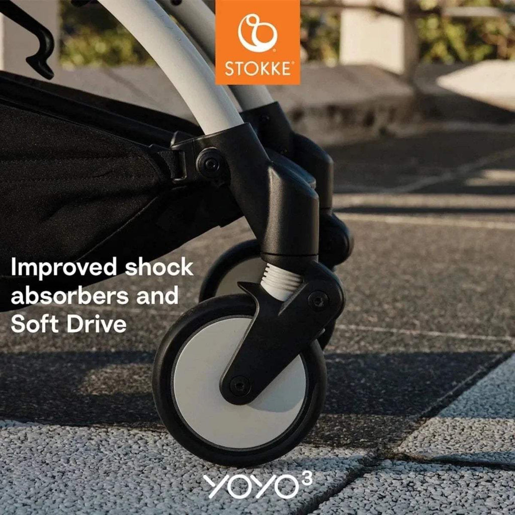 Stokke YOYO³ black stroller frame front wheel with shock absorber detail
