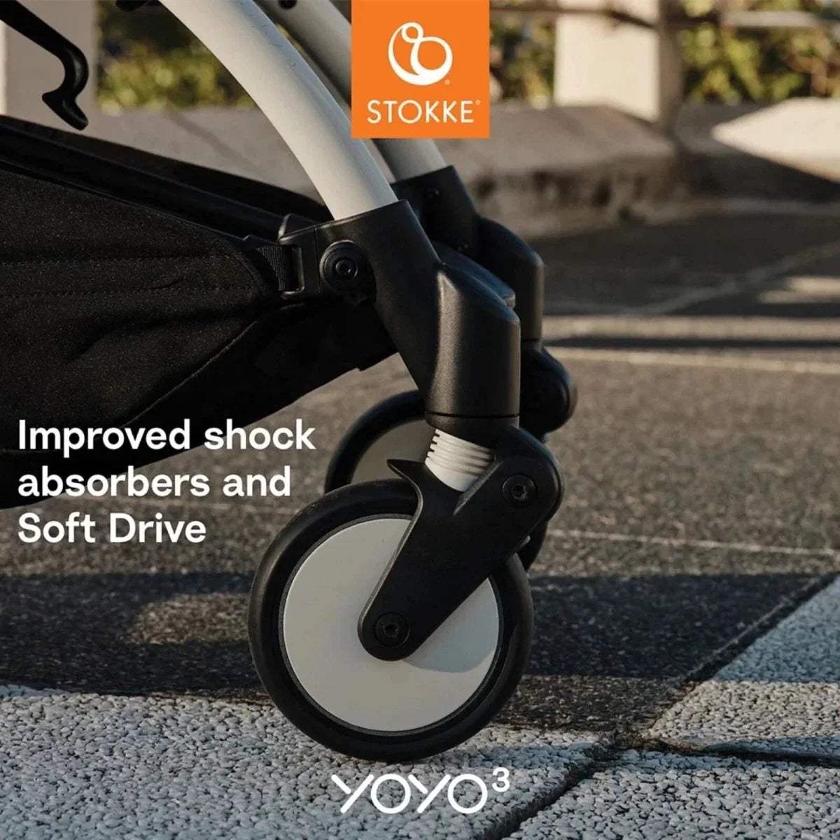 Stokke YOYO³ black stroller frame front wheel with shock absorber detail