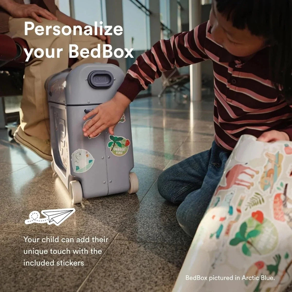 Kids BedBox portable suitcase with gray shell and round top carry handle