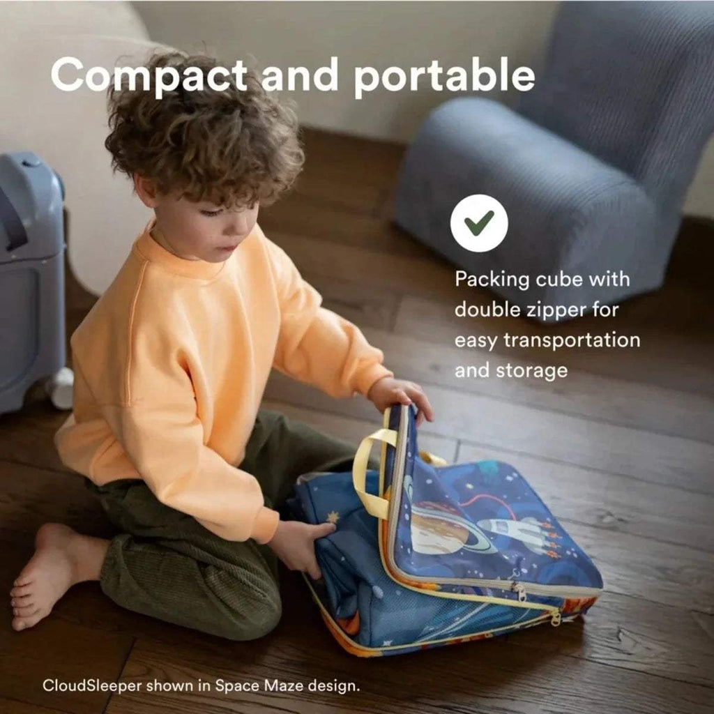 Stokke Jetkids CloudSleeper travel bed with blue space pattern packed for travel
