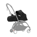Black newborn stroller set with canopy and carrycot on wheels