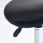 Black saddle stool seat with side backrest and chrome rolling support