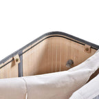 Inside view of grey laundry basket with removable beige liner and metal frame.