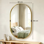 Gold-tone oval bathroom mirror, 60 x 90 cm, reflective glass with elevated frame