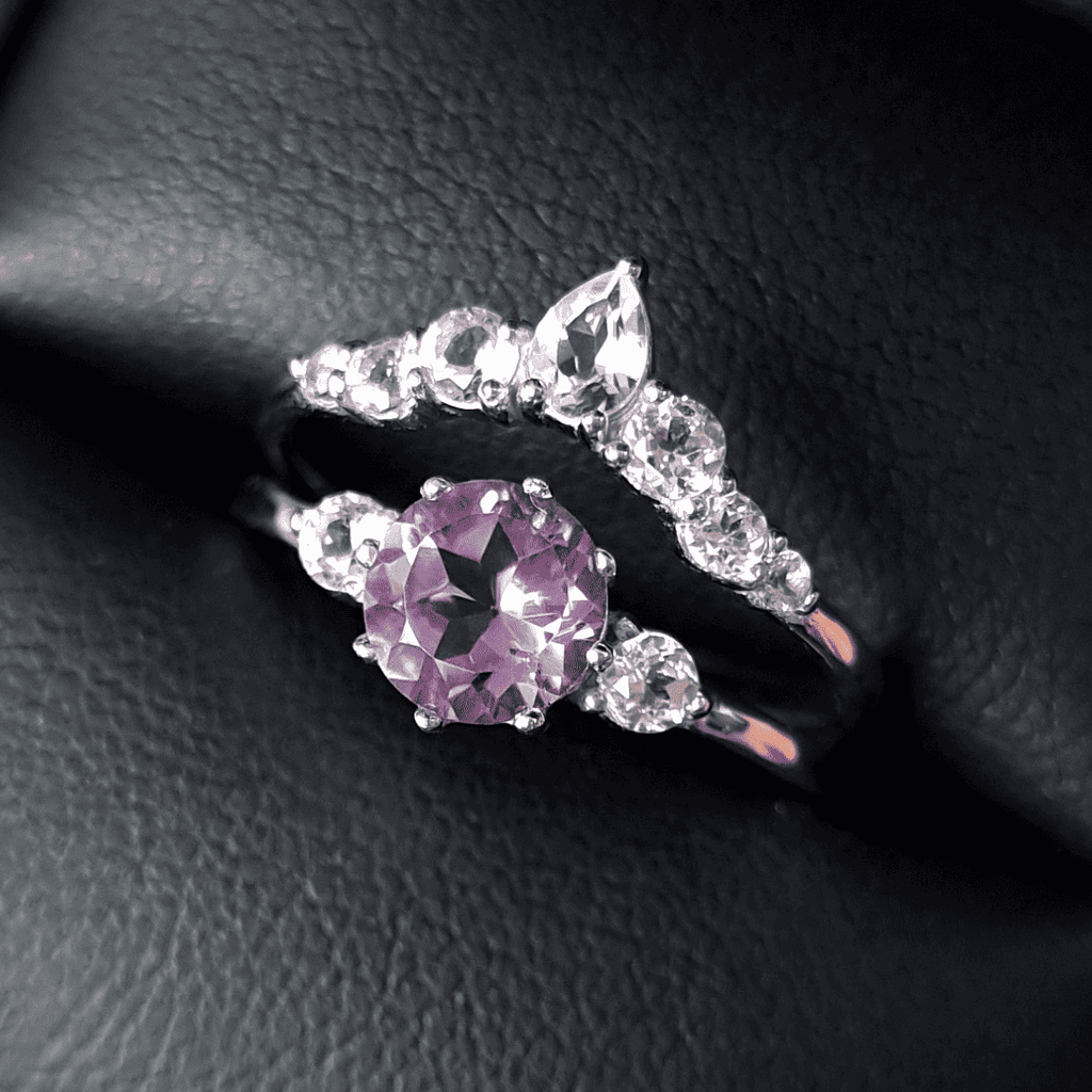 Sterling silver amethyst ring set with halo stones and curved side diamonds