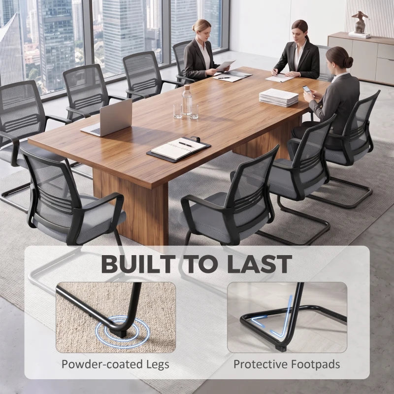 Dark grey office chairs with mesh backs and sled bases for meeting rooms