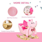 Pink plush elephant rocking toy with foldable rolling wheels and bow
