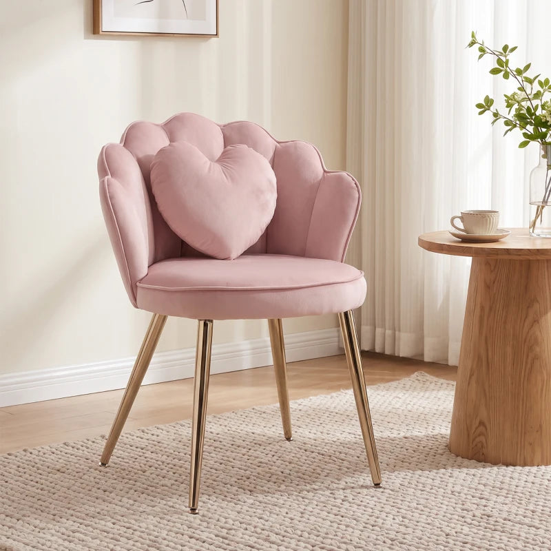 Pink velvet heart-back armchair with gold-tone legs and heart cushion on the seat
