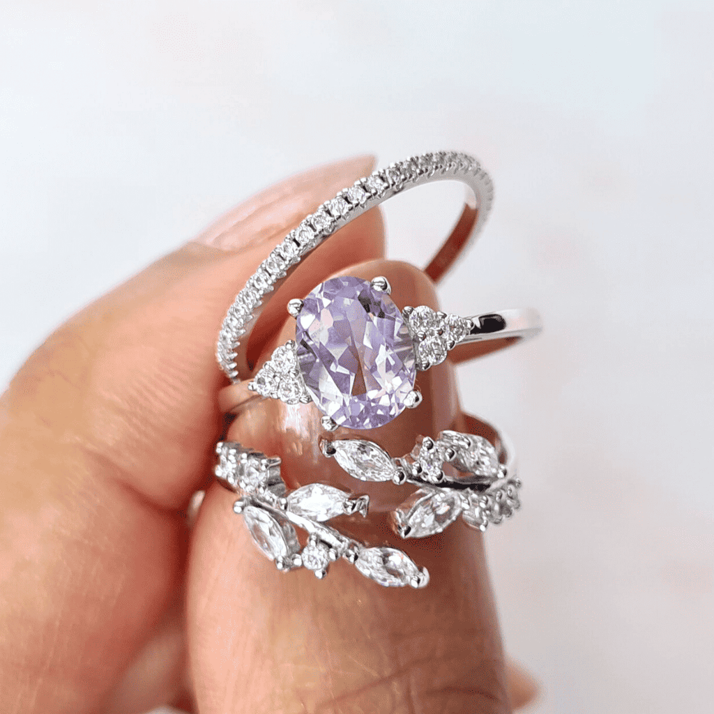 Sterling silver adjustable leaf ring with round lavender center stone and marquise accents