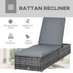 Grey padded rattan recliner lounger with upright backrest on woven frame