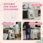 White kids step stool set up for kitchen and dining use with a toddler climbing