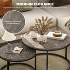 Round nesting coffee tables set with dark cement-style marbled tops and black metal frames
