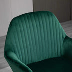 Green upholstered accent chair back with vertical channel tufting and rounded corners