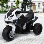 Black-and-white kids electric ride-on motorbike, front three-quarter view with thick tires.