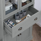 Grey pantry drawer with utensil organizer compartments and metal cup pulls