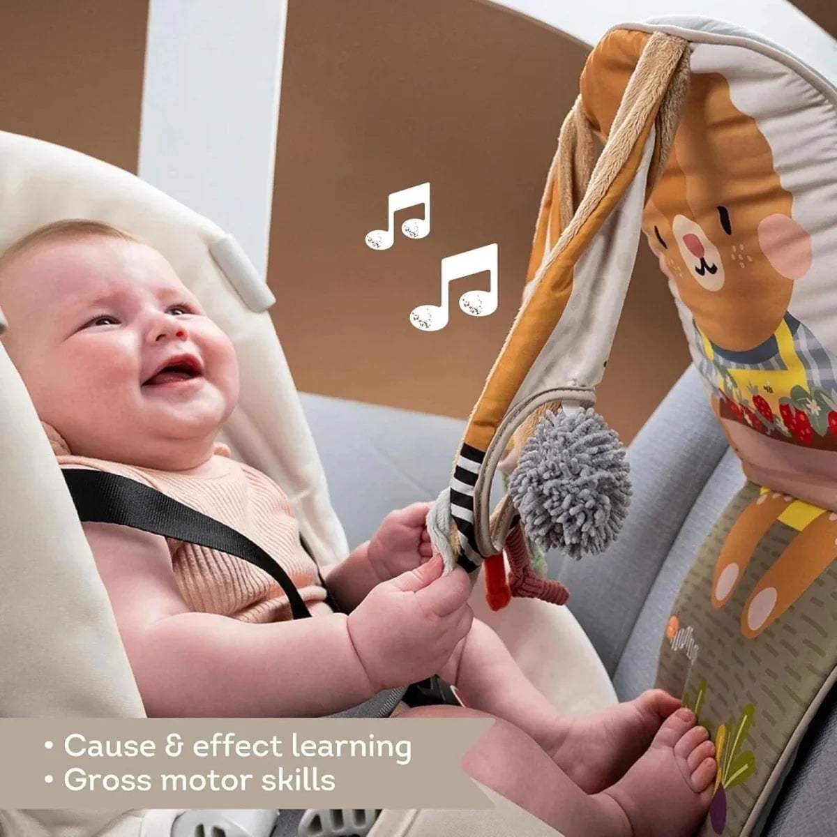 Baby-safe hanging bunny activity panel with gray pom-pom ball and textured side straps