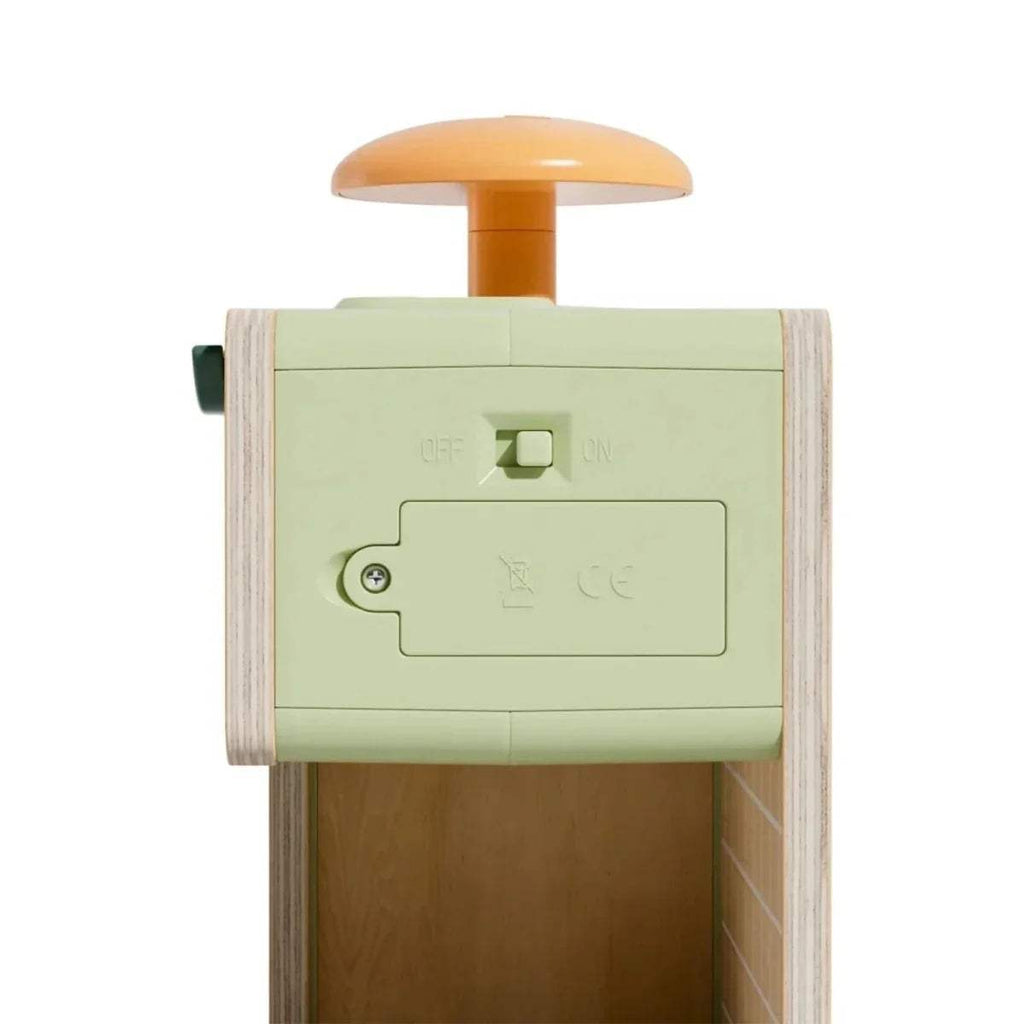 Back of wooden juice kiosk play set with orange top and control label