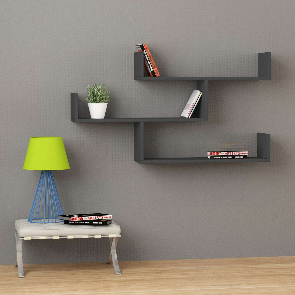 Dark grey floating wall shelf unit with three open compartments