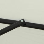 Black umbrella pole joint with clamp on crossbar beneath a white canopy