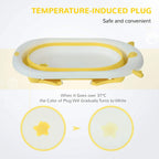 Temperature-indicating drain plug on yellow foldable baby bathtub