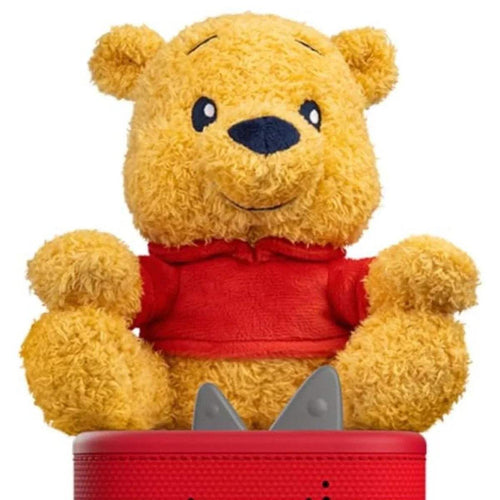 Winnie the Pooh Cuddle Tonie plush close-up with blue eyes and red shirt