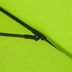 Light green parasol canopy edge with strap and latch near the rib support