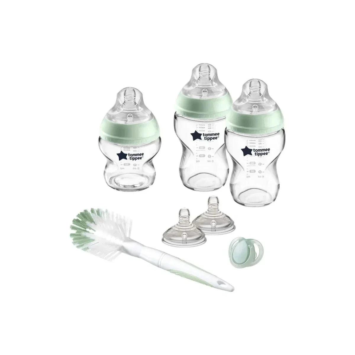 Baby glass feeding bottle starter kit with three mint anti-colic valves and caps