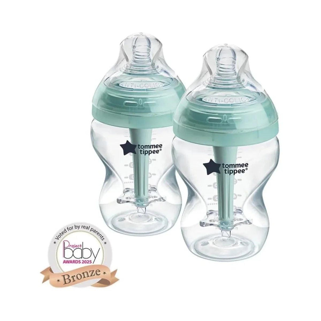Two anti-colic baby bottles with teal caps and clear body, angled front view