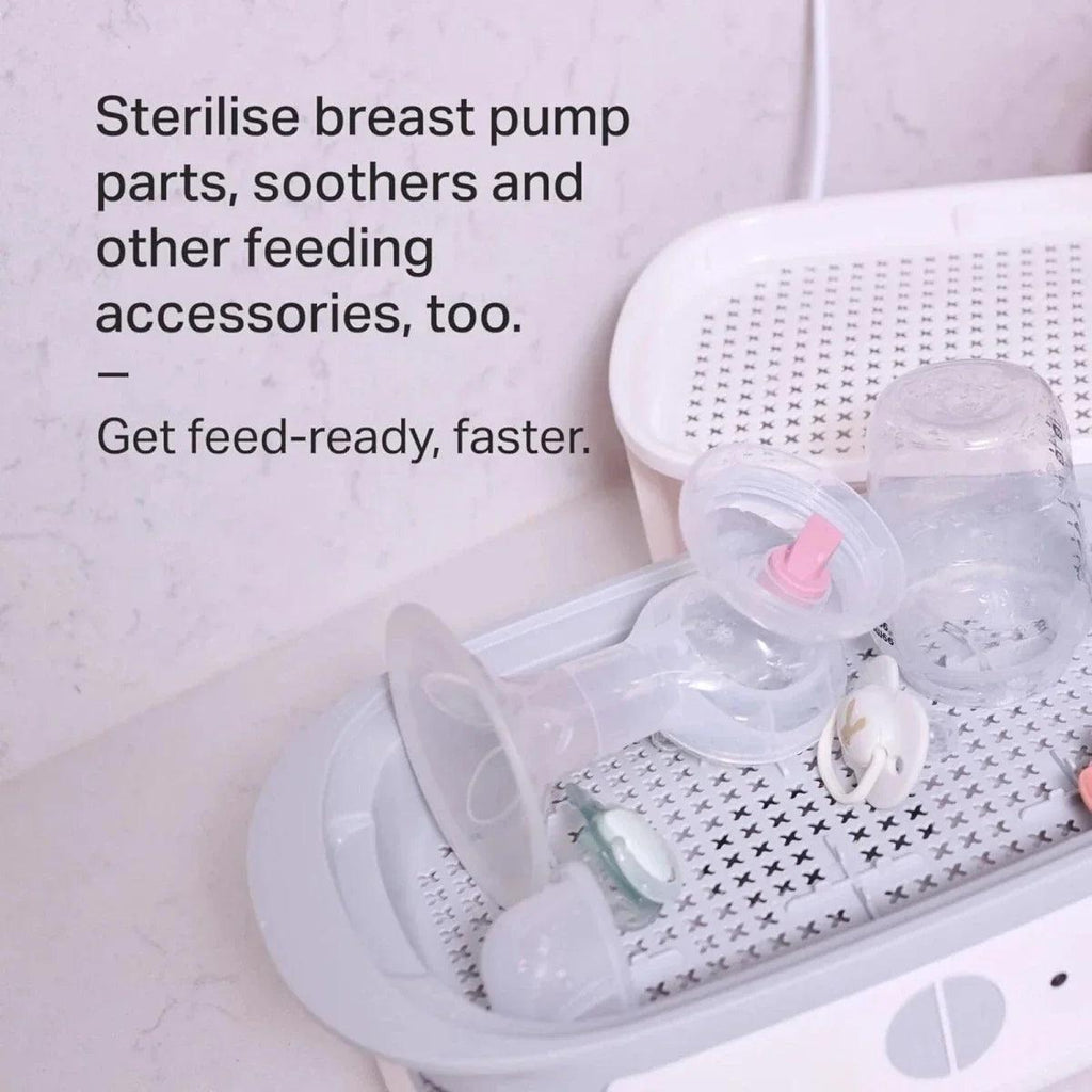 White steriliser basket holding breast pump parts and feeding accessories