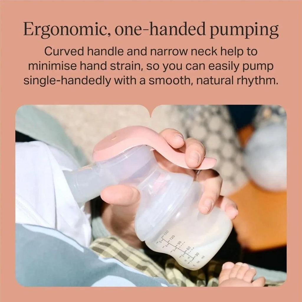 Ergonomic manual breast pump with curved pink handle and narrow neck