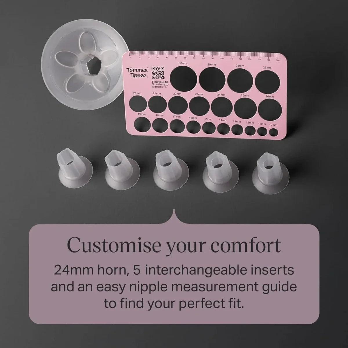 Manual breast pump with interchangeable inserts and measuring guide board