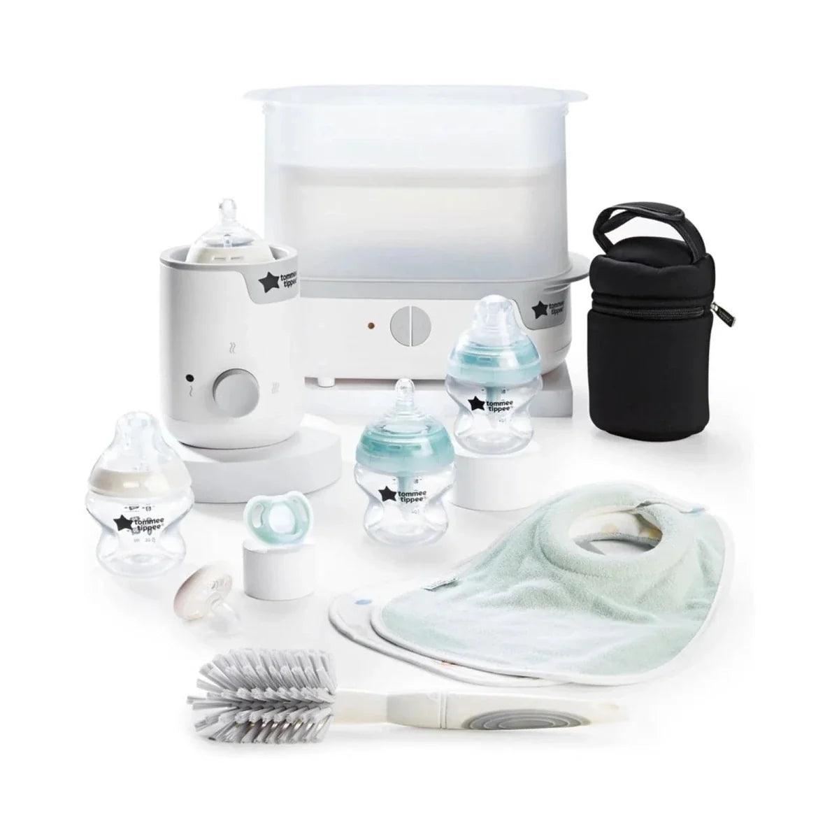 Tommee Tippee white feeding set with electric steam steriliser, bottles, bib, and brush