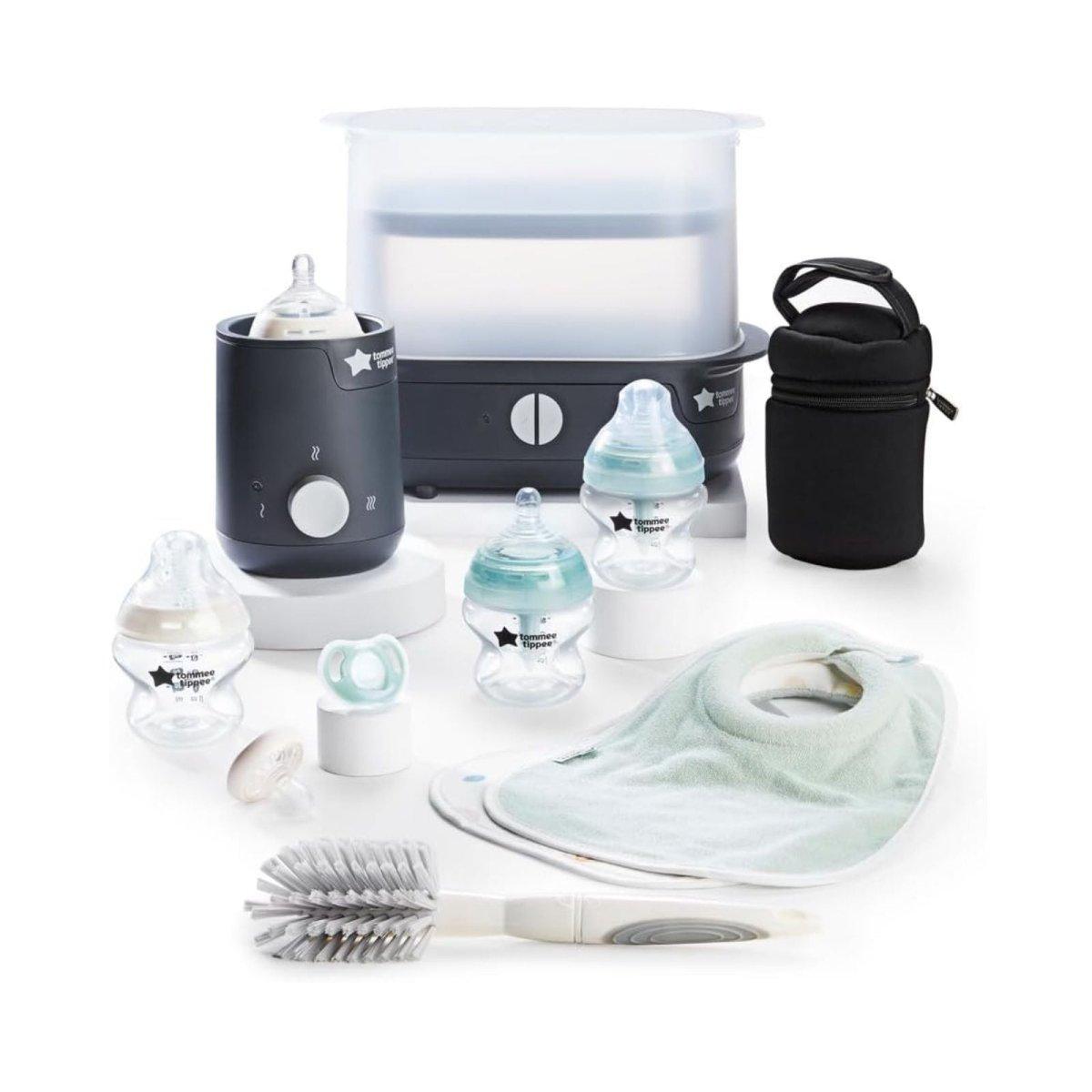 Black electric steam steriliser with feeding bottles, bib, brush, and warming cup set